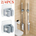Soporte de Pared para Escobas y Fregonas