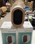 Calefactor cerámico sobre sus cajas, foto del almacén