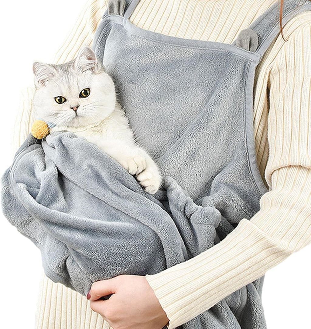 Delantal canguro NIDORA con un gato blanco dentro del bolsillo